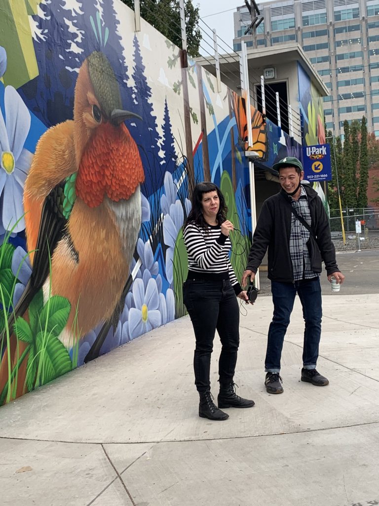 Jeremy Nichols and Tiffany Conklin speak at the mural opening celebration