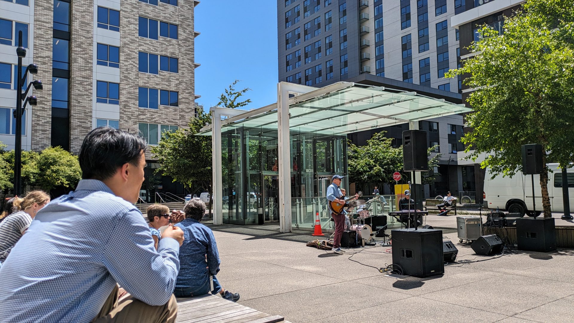photo of the concert series with a band playing in the courtyard