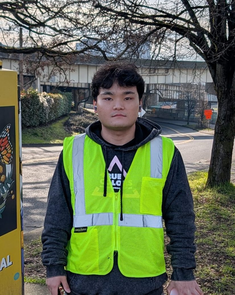 image of Jake wearing a safety vest at Peace Memorial Park
