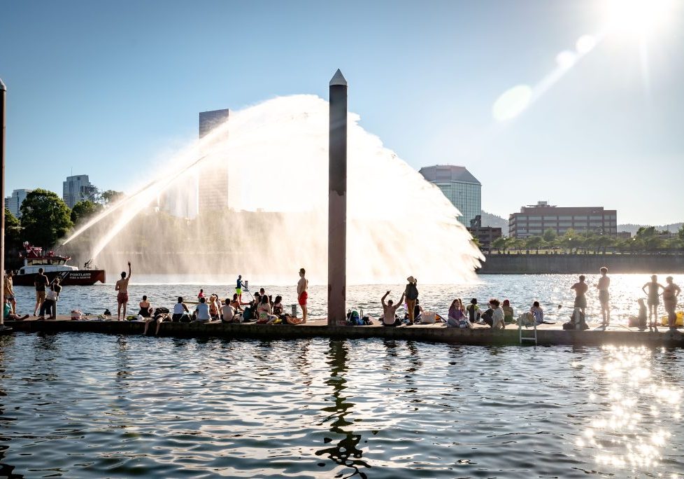 photo of a evening at Duckworth Summer Wednesdays featuring a people on the duck and fire boat spraying water
