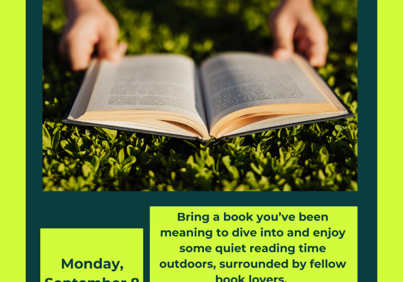 a book open on a green grass