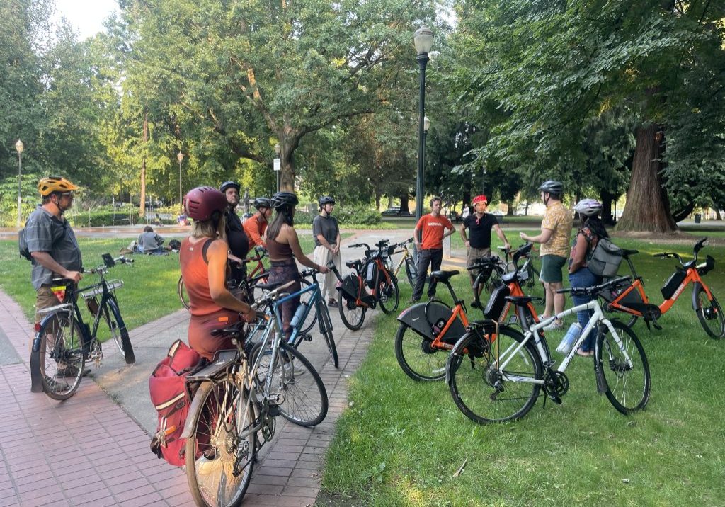 a group of bikers in Holladay Park
