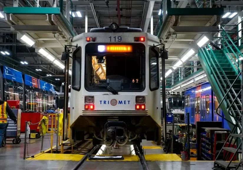 A Type 1 TriMet Metropolitan Area Express (MAX) light rail train sitting in its workshop.