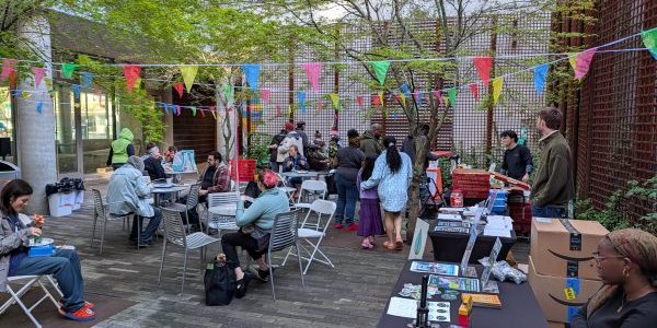 A picture of the Louisa Flowers Courtyard during the Social Event