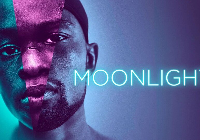 image a poster from the Movie Moonlight, featuring a black man the words "moonlight"