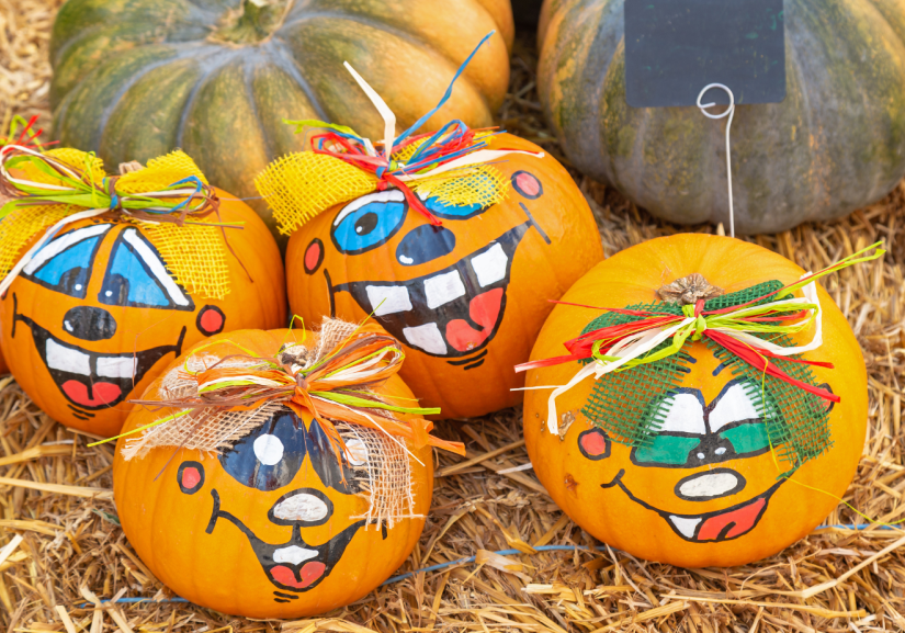 image of five painted pumpkins
